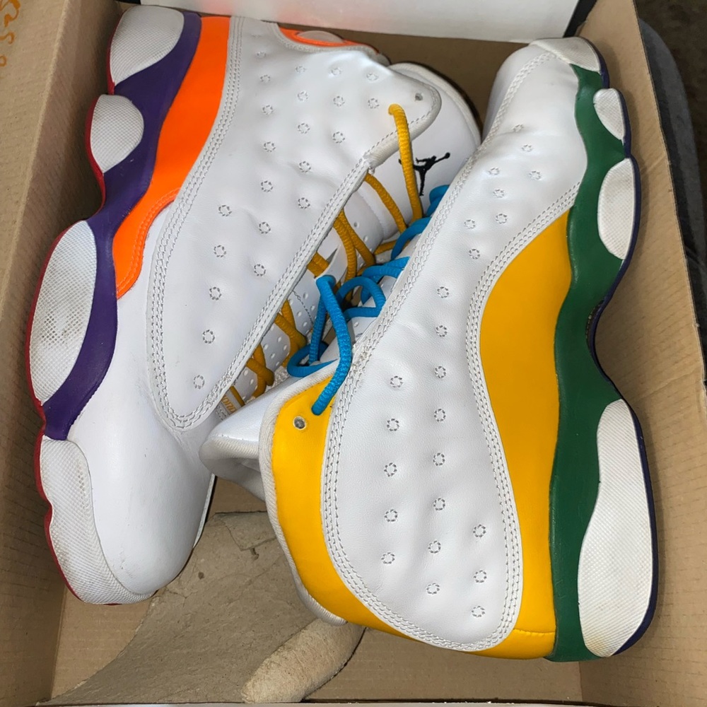 Size 7 YOUTH. Playground Retro 13 Jordan’s